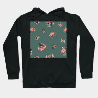 Orange and salmon roses over green Hoodie